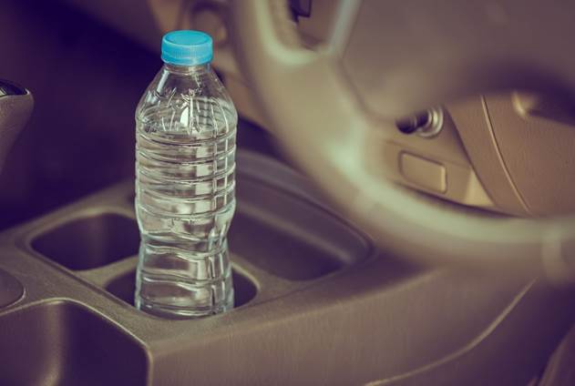Is it dangerous to carry a bottle of water in the car?